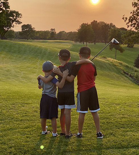 Boys playing golf on the springfield golf course