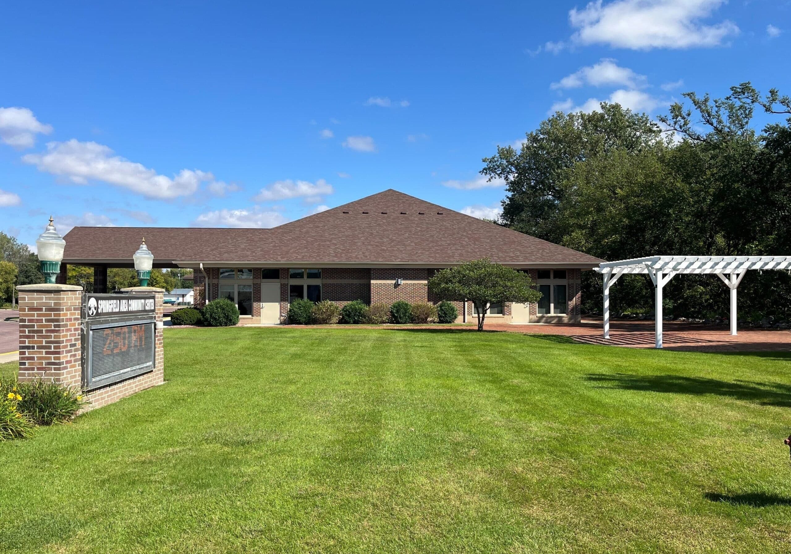 springfield community center west side exterior with a white gazebo